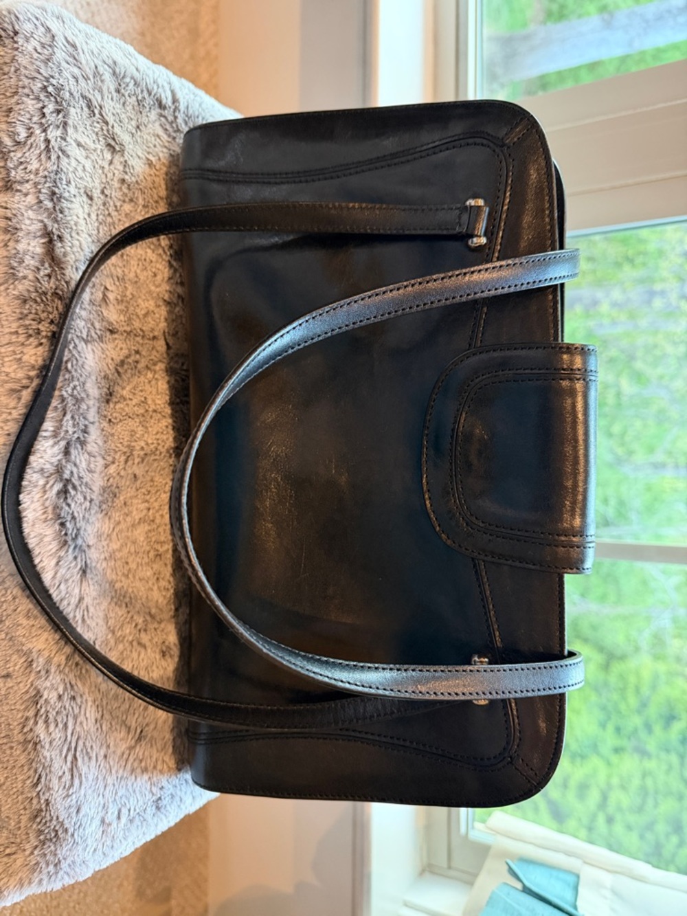 Women’s classic black Monsac shoulder bag. Minimal silver hardware.